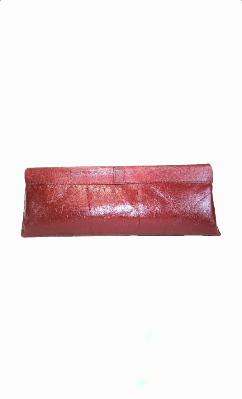 The Unarmed clutch. image 3